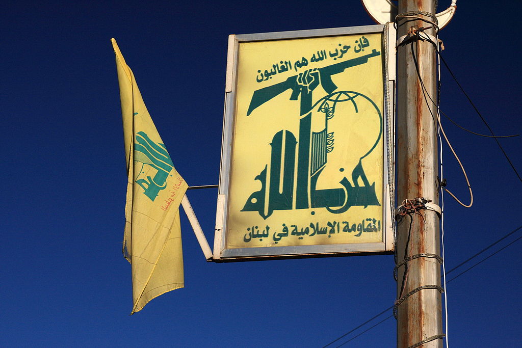 Hezbollah flag and logo in Baalbek, Lebanon. Maybe the gun gave them away? Photo: yeowatzup/wikimedia