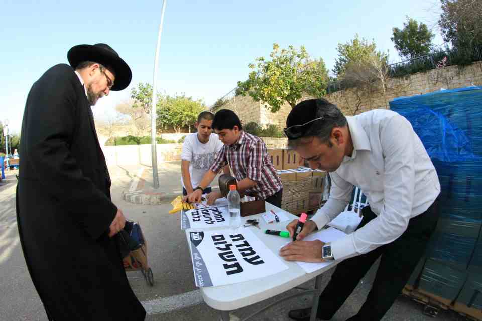 Tov party activists signing up new members. Photo: Tov Party Facebook page