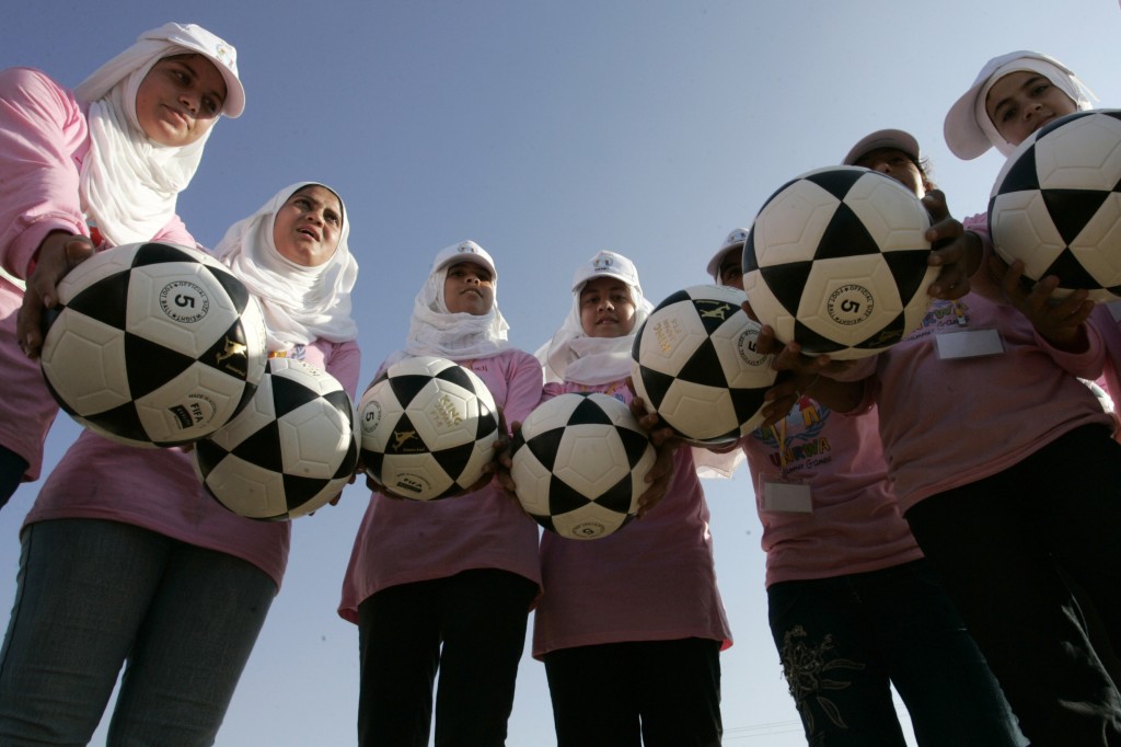 Your dollars at work: Gaza girls encouraged by UNRWA to break world record for most soccer balls bounced at the same time. Photo: Rahim Khatib / Flash90