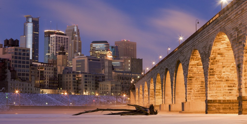 A winter view of Minneapolis from atop the frozen Mississippi River. Photo: jdkoenig / Wikimedia