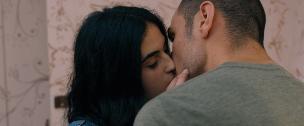 A moment of passion between Omar (Adam Bakri) and Nadia (Leem Lubany) is soon compromised by multiple betrayals in each of their lives. Photo: Adopt Films