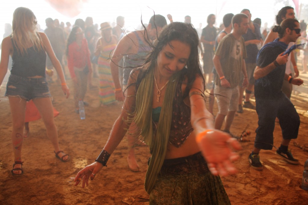 Israelis dance at a rave party in the Nahal Habesor in the south of Israel. Photo: Oren Nahshon / Flash90