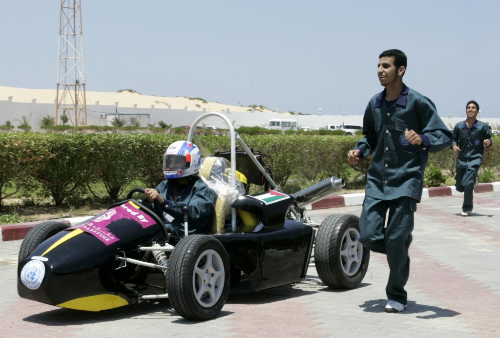 Palestinian students in an UNRWA college training  program test their Formula 1-style racecar in Khan Younis in the southern Gaza Strip. Photo: Abed Rahim Khatib / Flash 90