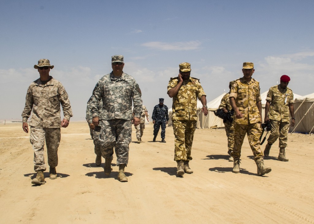 Officers from the United States Army and Marine Corps accompany officers from the Qatari Emiri Land Force during Eagle Resolve,  a multilateral military exercise that took place in Qatar in 2013. Photo: Juanenrique Owings / Wikimedia