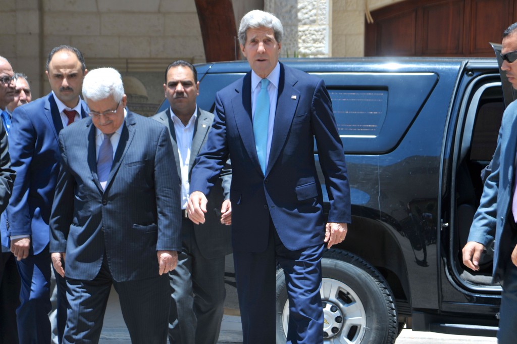 U.S. Secretary of State John Kerry and Palestinian Authority President Mahmoud Abbas approach a gaggle of reporters after concluding their meeting in Ramallah, West Bank, on June 30, 2013. Photo: U.S. Department of State / Wikimedia