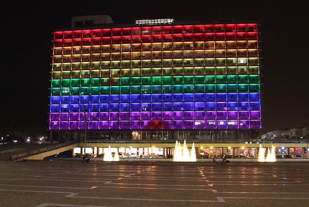 The Tel Aviv municipality building, at Rabin Square, is lit with the colors of the Pride flag ahead of Tel Aviv Gay Pride Week, June 8-14, 2014. Photo: Gideon Markowicz / Flash 90