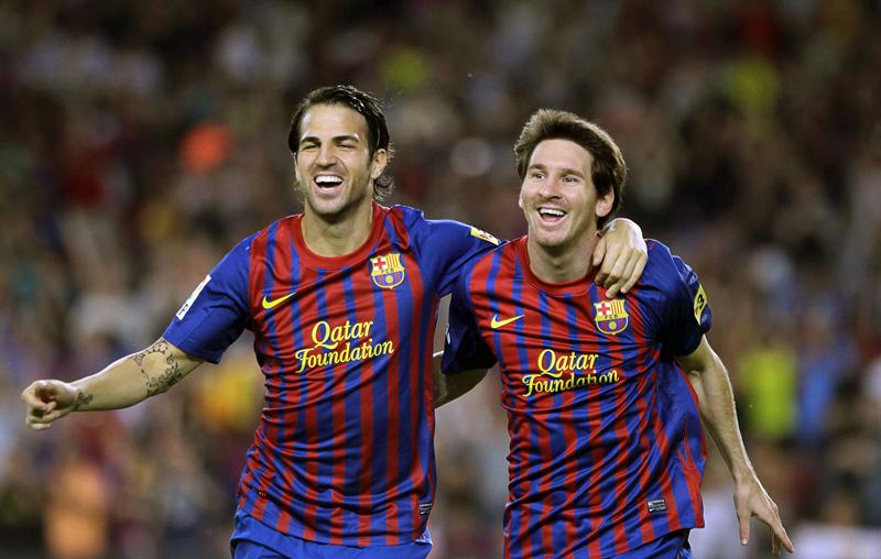 FC Barcelona's Lionel Messi (R) and Cesc Fabregas celebrate a goal. Photo: Globovisión / flickr