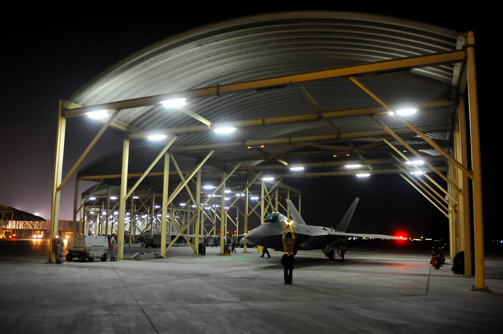 An F-22A Raptor waits to taxi prior to strike operations in Syria Sept. 23, 2014. These aircraft were part of a large coalition strike package that was the first to strike Islamic State targets in Syria. Photo: Russ Scalf / The National Guard / flickr