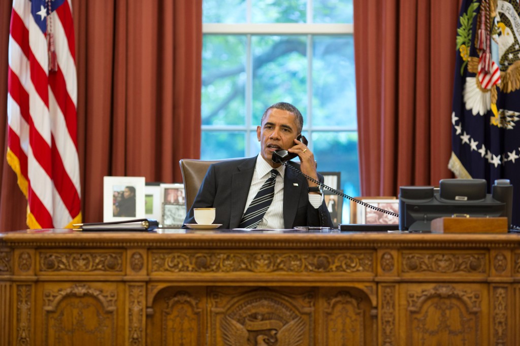 U.S. President Barack Obama talks with the President of Iran, Hassan Rouhani, during a telephone call in the Oval Office on September 27, 2013. Photo: Pete Souza / Wikimedia