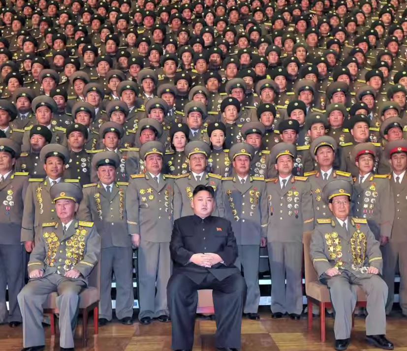 Kim Jong Il sits amid North Korean military leaders. Photo: CNN / YouTube