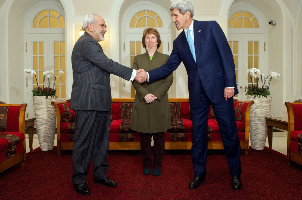 U.S. Secretary of State John Kerry shakes hands with Foreign Minister Mohammad Javad Zarif of Iran while watched by Baroness Catherine Ashton of the European Union before sitting down in Vienna, Austria, on November 20, 2014, for a three-way discussion about the future of Iran's nuclear program. Photo: U.S. Department of State / flickr