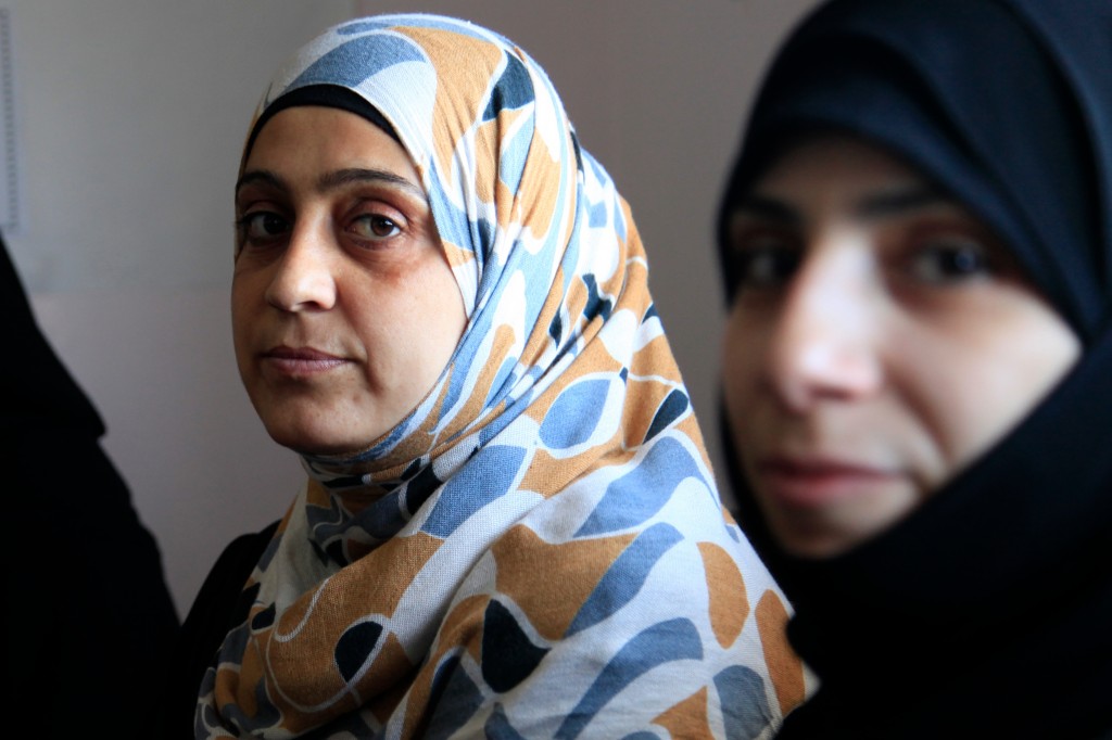 Female refugees attend a counseling session at a clinic near Mafraq in northern Jordan. Photo: Russell Watkins / UK Department for International Development / Wikimedia