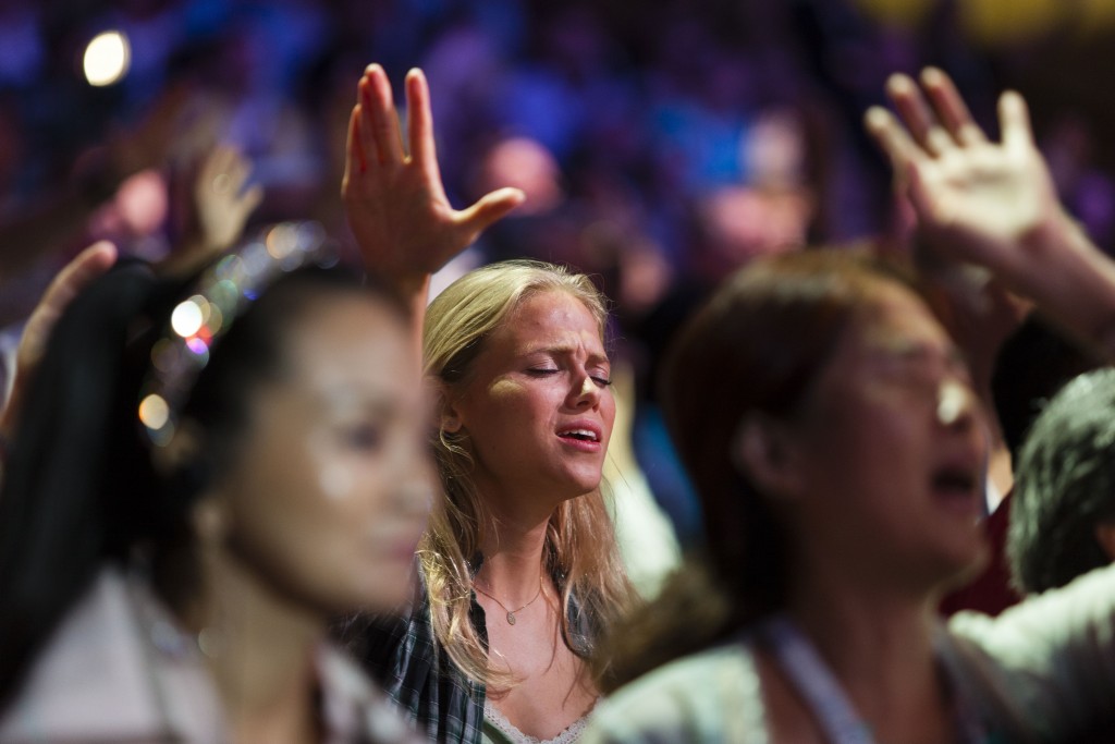 Evangelical Christians from around the world sing and recite prayers as they attend the 2013 Jerusalem Chairman's Conference hosted by the Israel Allies Foundation, at the International Convention Center in Jerusalem, on September 22, 2013. Photo: Flash90