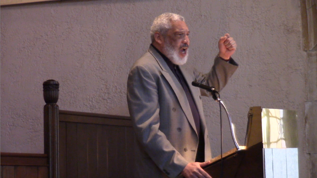 Rev. Graylan S. Hagler, Senior Minister of the Plymouth Congregational United Church of Christ of Washington, DC, speaking at the Sabeel DC Metro 4th Annual Spring Program on May 2, 2015 at the Sixth Presbyterian Church. Photo: ZSE4321qwe / YouTube