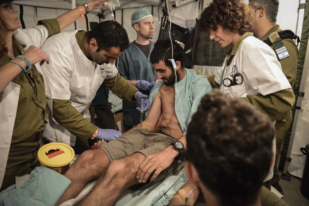 A man is treated for injuries at the Israeli field hospital in Nepal. Photo: IDF / Flash90