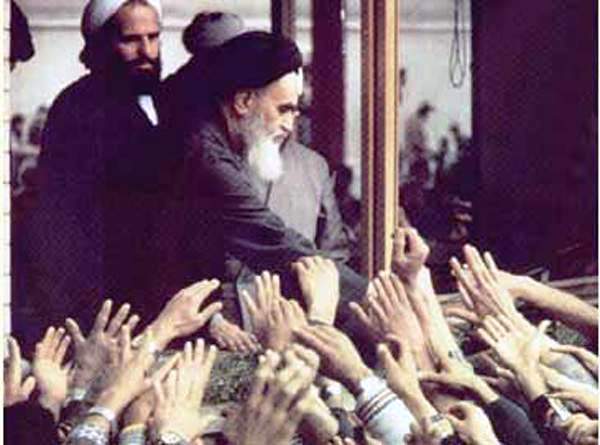 Ayatollah Ruhollah Khomeini greets followers.