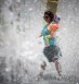 Israelis play in a fountain on a hot summer day in Jerusalem, May 27, 2015. Photo: Yonatan Sindel / Flash90