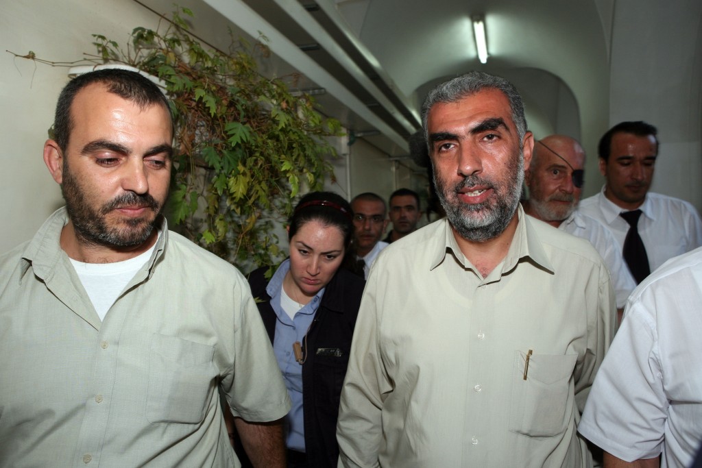 Islamic Movement deputy leader Kamal Hatib is brought to arraignment at the Jerusalem municipal court after police arrested him for provoking riots on the Temple Mount and in eastern Jerusalem. October 4, 2009. Photo by Matanya Tausig / Flash90