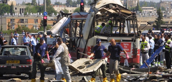 **FILE2002**
Paramedics and police at the scene of a suicide bombing killing 19 and injuring 74 on a bus in Jerusalem. Hamas claimed responsibility for the attack. June 18, 2002. Photo by Flash90