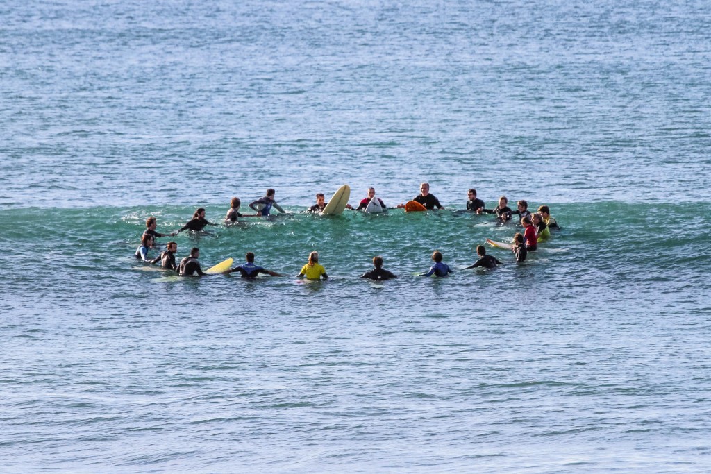 A group gathers in the ocean. Photo: Nadia Gahli