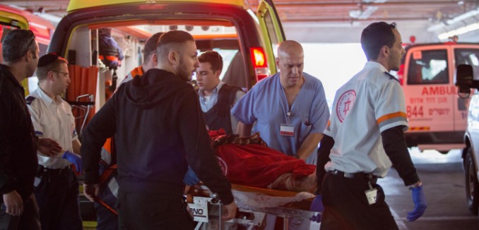Wounded Israelis are evacuated at to emergency at Shaarei Tzedek hospital in Jerusalem, after they were wounded when a Palestinian driver rammed his car into a bus stop injuring about 13 people who were waiting there, on Herzl Boulevard at the entrance to the city, on December 14, 2015. Three of the victims were moderately wounded, one of them an infant, and the rest were lightly wounded. The attaker was shot at the scene, and an axe was found in his vehicle. Photo by Hadas Parush/Flash90 *** Local Caption *** ???????
?????
????
?????
???? ???????
?????
???
??? ???????
????
??????
???????
??????
?????
???? ???
????