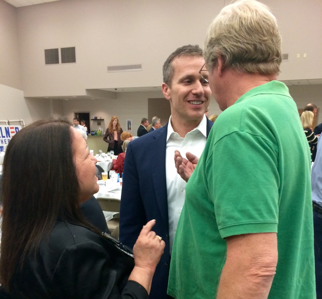 Eric Greitens speaks with voters, including Roberta Brouk (left), vice chair of the Franklin County Republican Central Committee and winner of the Franklin County Republican Activist of the Year award. Photo: Miriam Pollock / The Tower