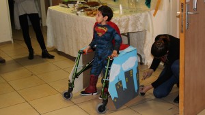 Design students helped six-year-old Brian become Superman for the day. Photo courtesy of Beit Issie Shapiro.