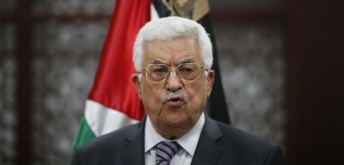 Palestinian president Mahmud Abbas speaks during a press conference in the West Bank city of Ramallah on July 31, 2015, following an arson attack by Jewish extremists that killed a Palestinian toddler. Abbas said he would appeal to the International Criminal Court (ICC) in The Hague to investigate the attack. Photo by FLASH90 *** Local Caption *** ????? ????
??? ????