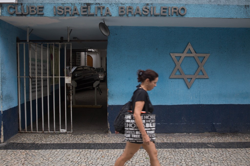 A woman walks by a Jewish community center in Rio de Janeiro, Brazil. Photo: Nati Shohat / Flash90