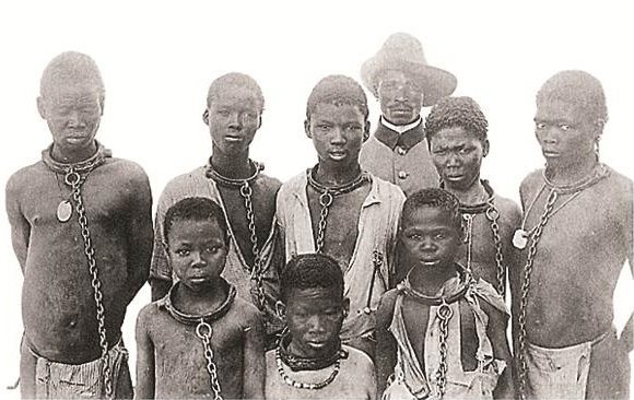 Captured Africans in chains, circa 1907/8.