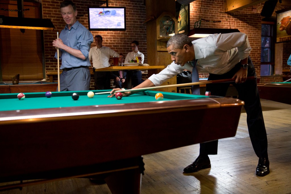 President Barack Obama plays pool with Colorado governor John Hickenlooper in Denver, July 8, 2014. Photo: Pete Souza / White House