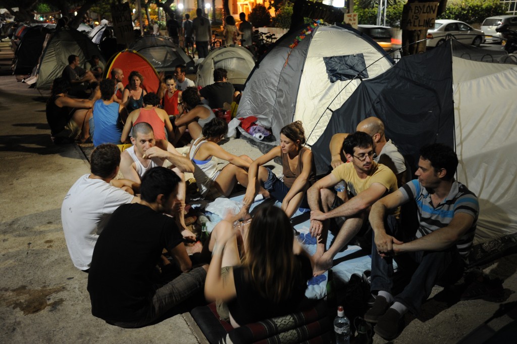 Israelis sit in the tent camp in Tel Aviv to protest against rising housing prices, July 25, 2011. Photo: Gili Yaari / Flash90