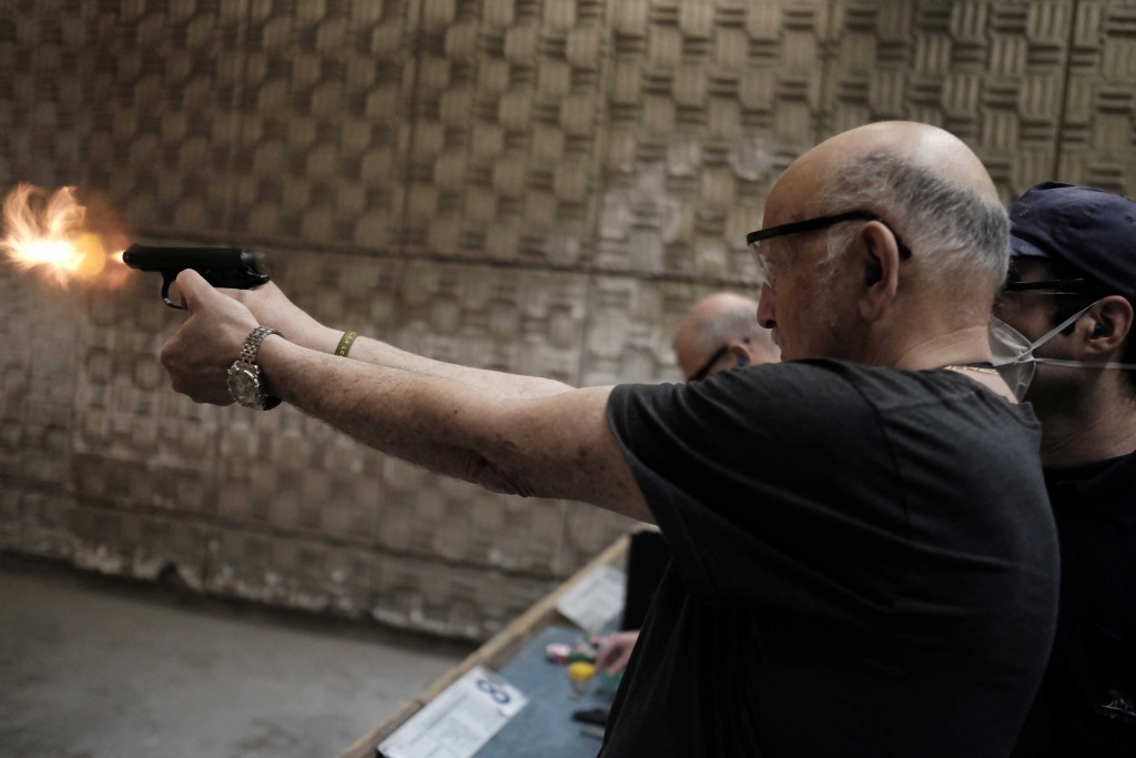 Israelis practice shooting handguns at Olympic Gun Range in Herzliya. Photo: Tomer Neuberg / Flash90