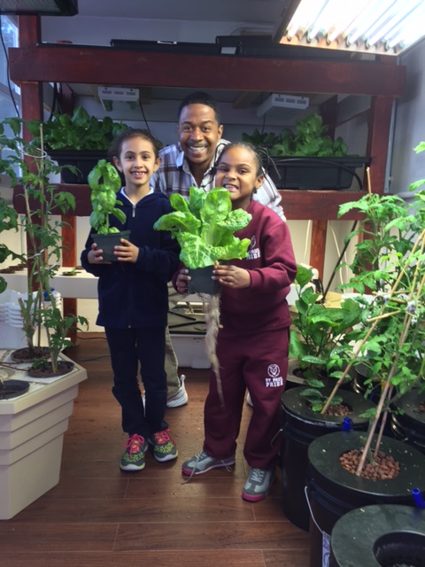 Director of Operations Randy Cameron with Seed Street participants. Photo: courtesy