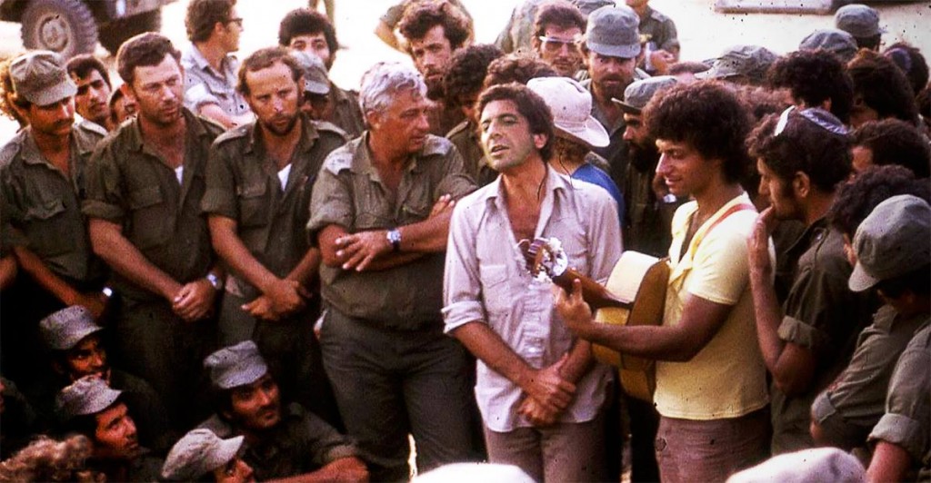 Leonard Cohen (in white) and Ariel Sharon (to his right) during the Yom Kippur War.