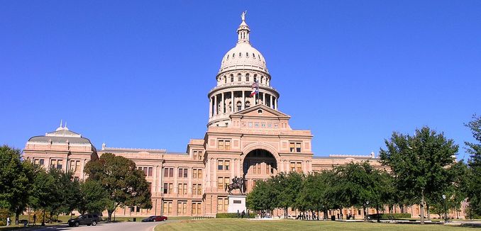 FeaturedImage_2017-05-18_WikiCommons_1200px-Texas_State_Capitol_building-front_left_front_oblique_view (1)