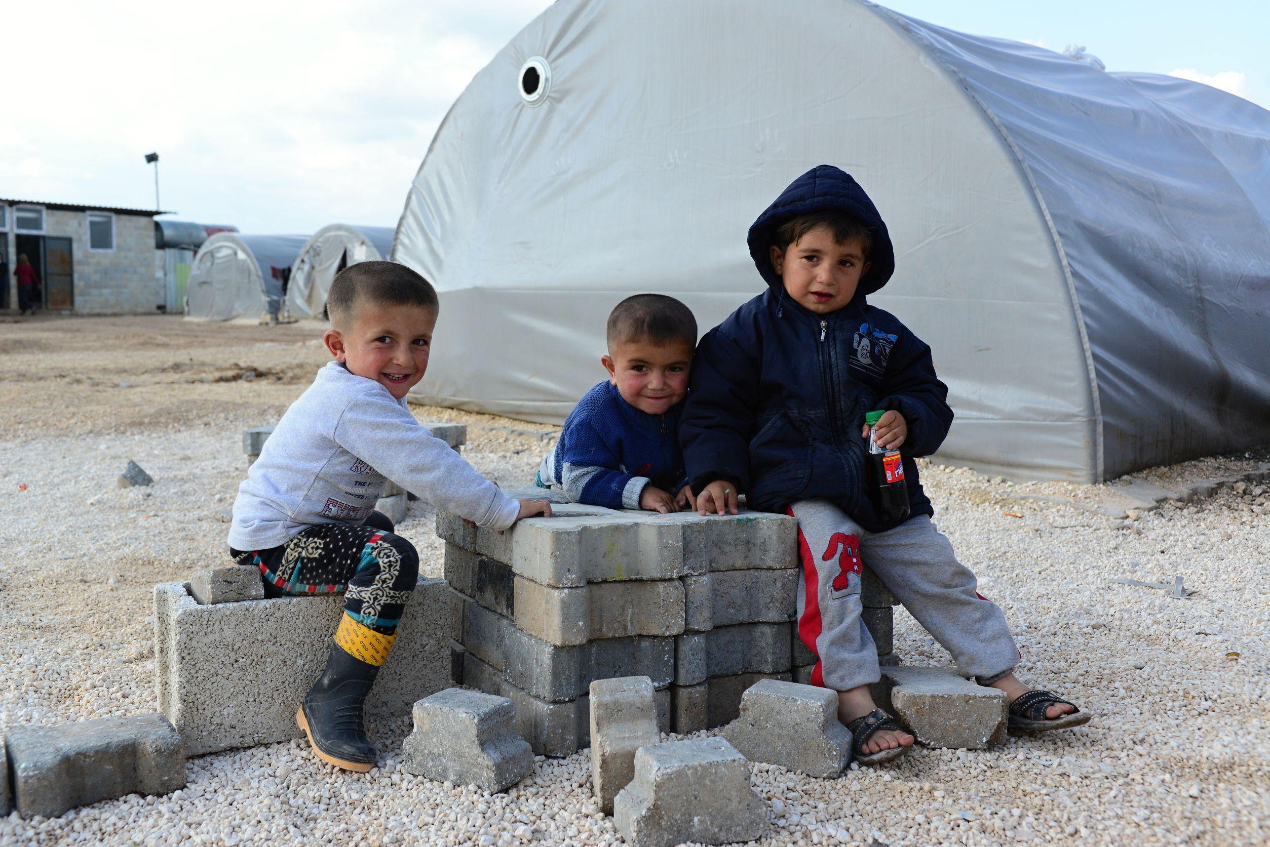 Syrian children from Kobane in a refugee camp in Suruc, Turkey. [Photo: radekprocyk / 123RF]