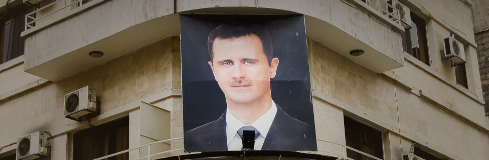 61978247 - damascus, syria - january 14, 2010:  photo of president bashar al-assad on a building in the capital city before the outbreak of the civil war