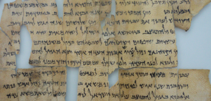 The so-called "Dead Sea Scrolls" are a set of ancient Jewish/Biblical documents discovered on the northwest shore of the Dead Sea between 1946 and 1956.  Most are in Israel today, but this (and others) are in Jordan since borders have shifted over the years.  Written in Hebrew, Aramaic and Greek, mostly on parchment, but with some written on papyrus and even copper, these manuscripts generally date between 150 BC and 70 AD.  Many scholars believe therw were buried just before the Romans put down the "Jewish rebellion" that ran from about 67 to 73 AD.  The scrolls are traditionally identified with the ancient Jewish sect called the Essenes, but scholars debate that.  In fact, many of the scrolls were declared "state secrets" when they were found.  It is sort of strange to think that something written over 2,000 years ago could still represent a national security risk today.