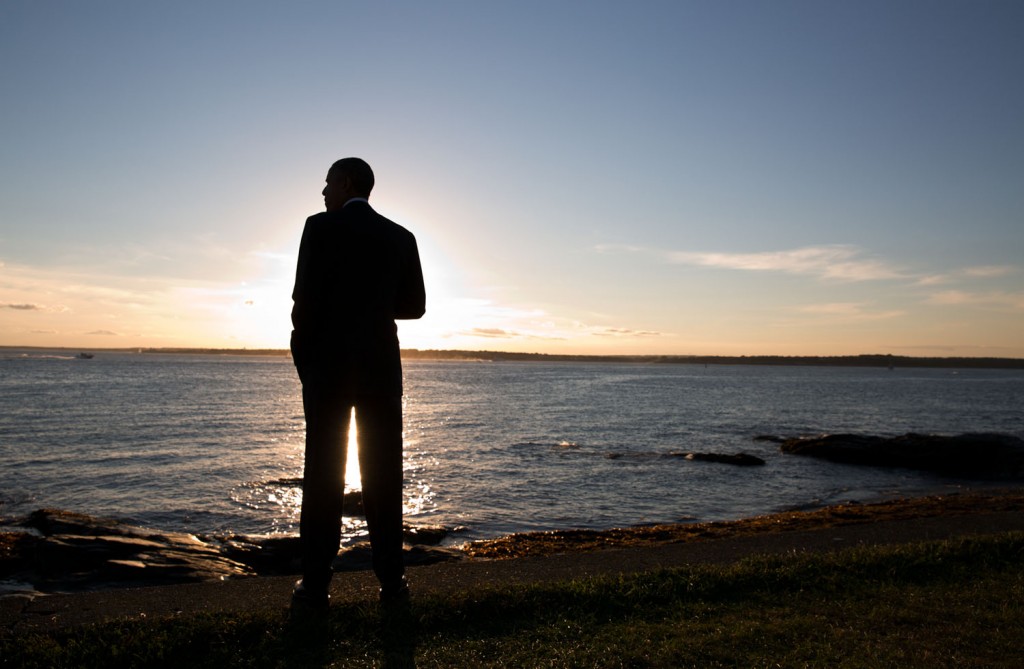 President Barack Obama looks out at the sunset at Brenton Point in Newport, R.I., August 29, 2014. Photo: Pete Souza / White House