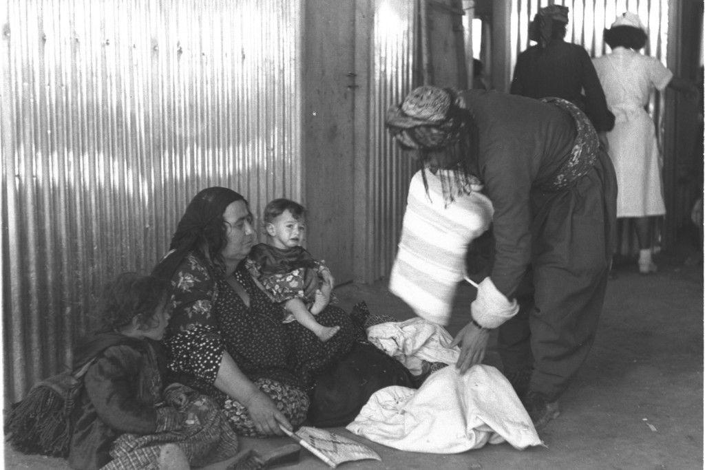 An Iraqi Jewish family packs before leaving the country, 1951. Photo: Teddy Brauner / Wikimedia